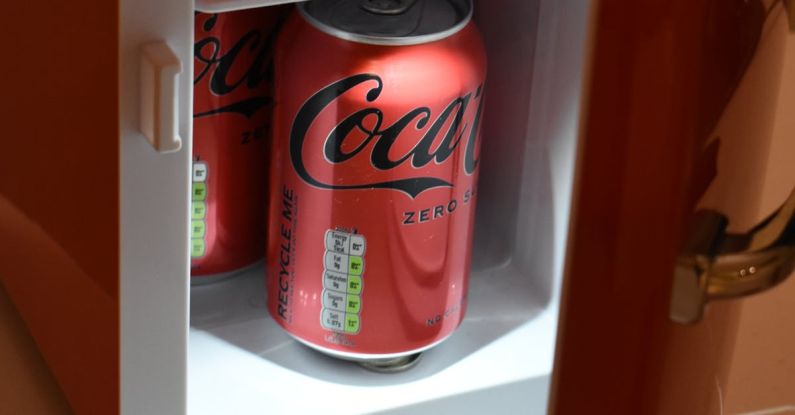 Open Shelving - Red Coca-Cola Can in a Small Fridge