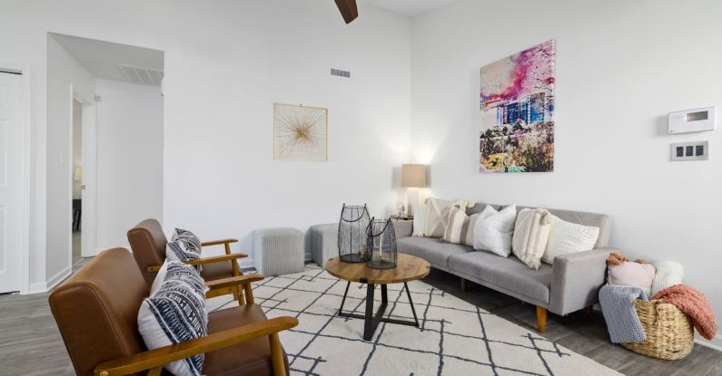 Vinyl Flooring - Brown Armchairs with Throw Pillows on the Sofa