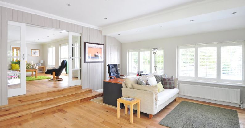 Flooring - White Couch Near Black Mat