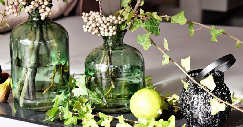 Vases - Green Leaved Plants in Green Clear Glass Vase